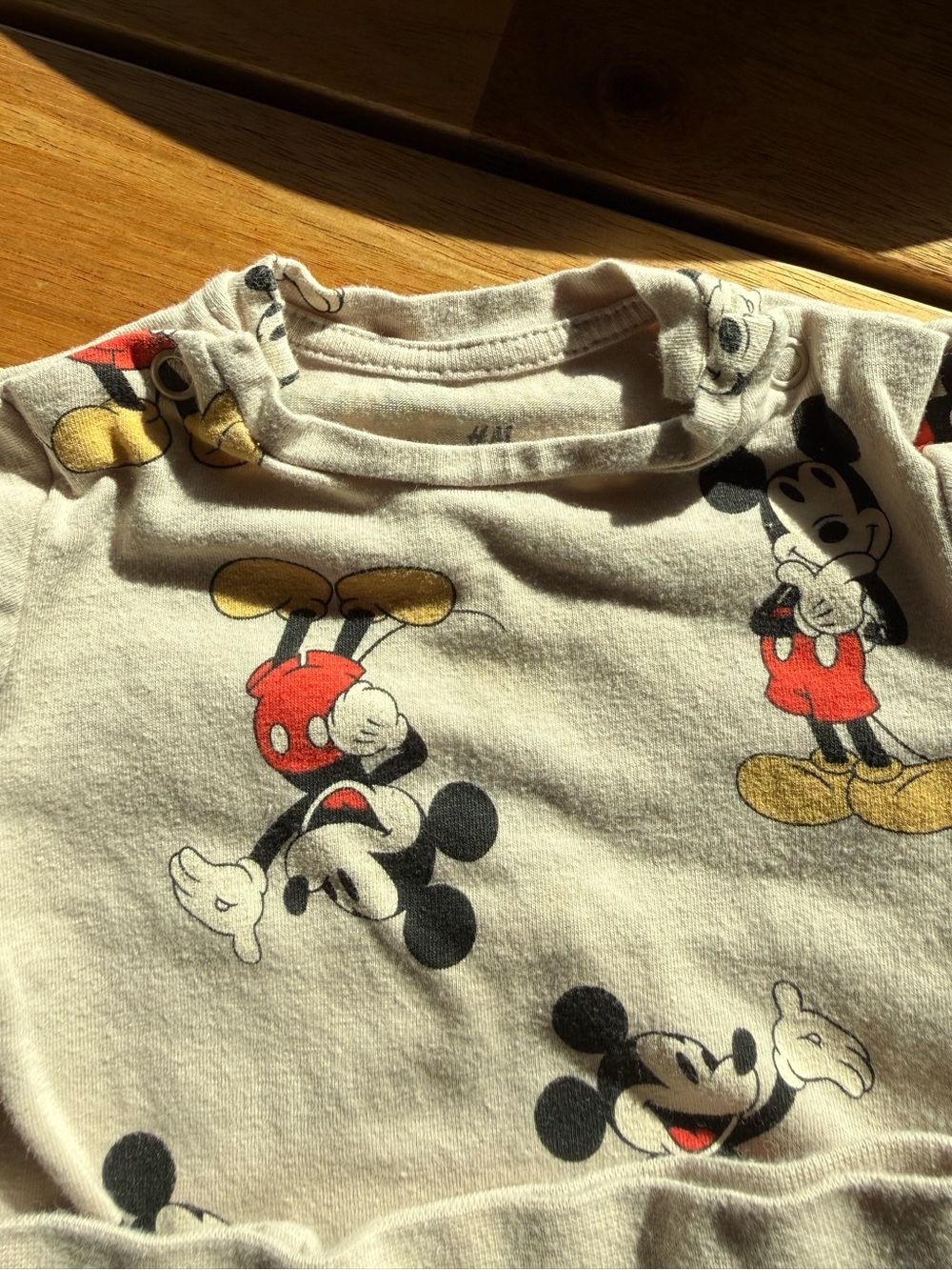 H&M Beige Mickey Mouse Baby One-Piece Set with Red & Yellow Accents - Picture 3 of 5